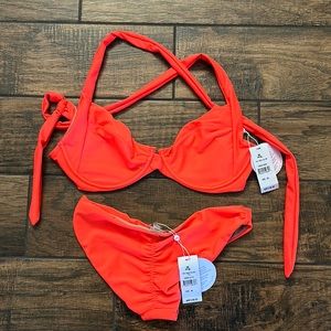 Brand new PQ swim suit. Top - Size D